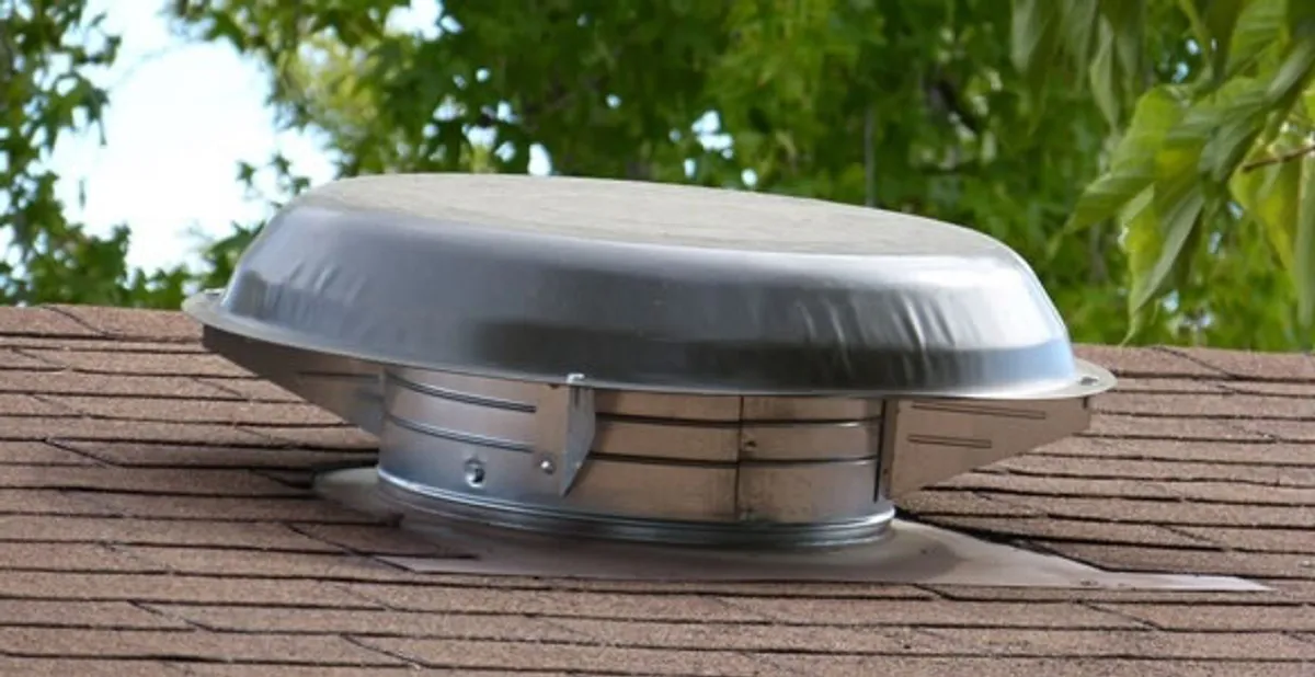 attic fan installation services with low-profile roof ventilation unit in Bradenton, FL