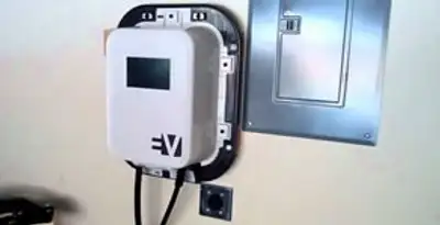 Electric car charger installation with wall-mounted EV charging station in Bradenton, FL
