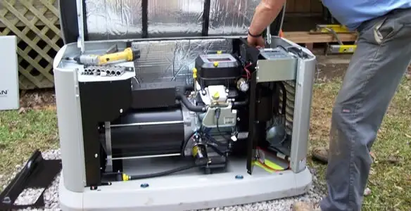 generator installation service showing technician connecting and configuring generator components in Bradenton, FL