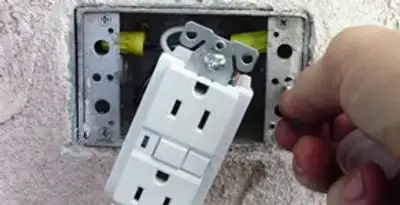 gfci circuits service showing installation of a ground fault circuit interrupter outlet by licensed electricians in Bradenton, FL