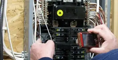Home electrical inspection of circuit breaker panel by licensed electrician in Bradenton, FL