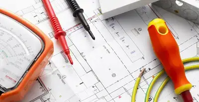 licensed electrician planning and testing electrical systems using professional tools in Bradenton, FL