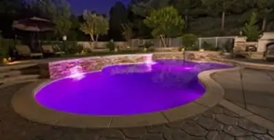 pool light installation and repair services illuminating a residential swimming pool in Bradenton, FL