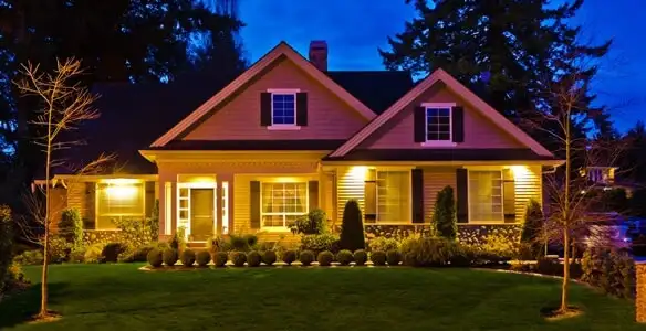 security light installation services illuminating a residential exterior at night in Bradenton, FL