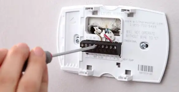 Thermostat installation service with proper wiring and secure wall mounting in Bradenton, FL